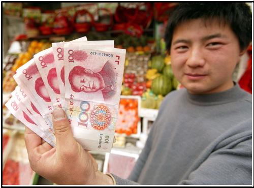 Snop novčanica od 100 yuana, kineska valuta sa slikom Mao Zentunga
